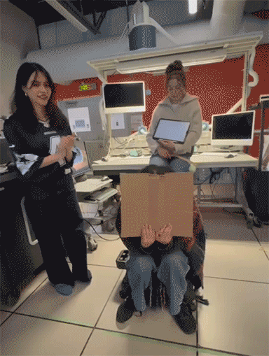 We tried different set ups for how the set up could go and found it went better having one person acting as the stove/oven and the other acting as the new feature that is an extension of the back of the stove. This way the other person's head could be the stove top where the other person would place the pan.